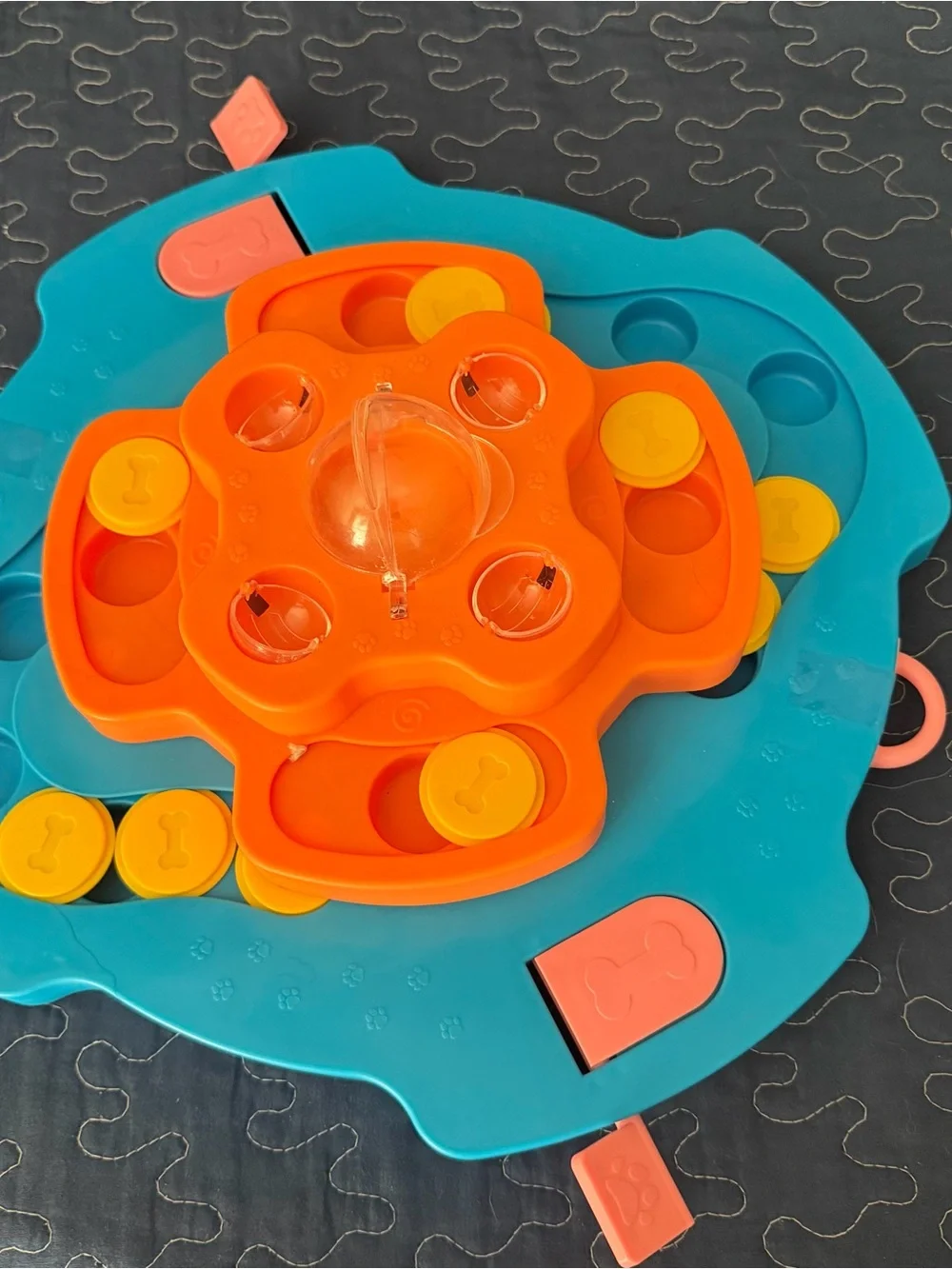 Pet toy: Pop-and-Sort Stackable Puzzle Toy hides treat and pet seeks them.